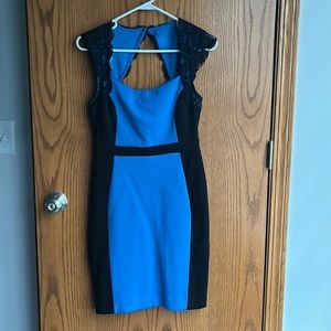 Nicole by Nicole Miller Color Black lace accented keyhole dress. Size small.